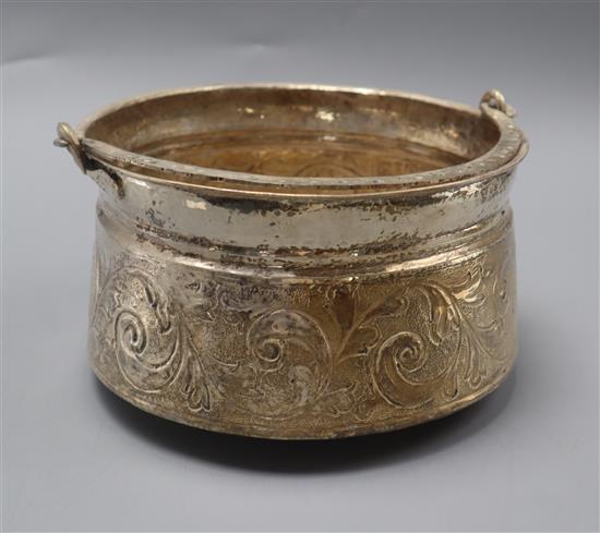 A continental repousse white metal hanging bowl with swing handle, 19 oz.